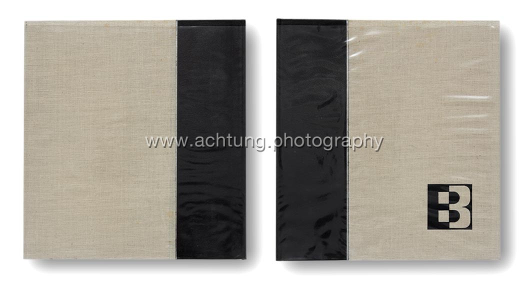 Spanish half leather edition , cover with plastic dust jacket, back and front